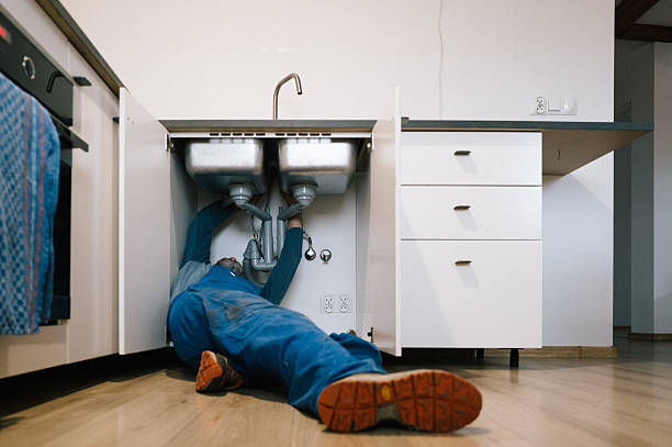 Professional Drain Cleaning technician working in Flora, IL